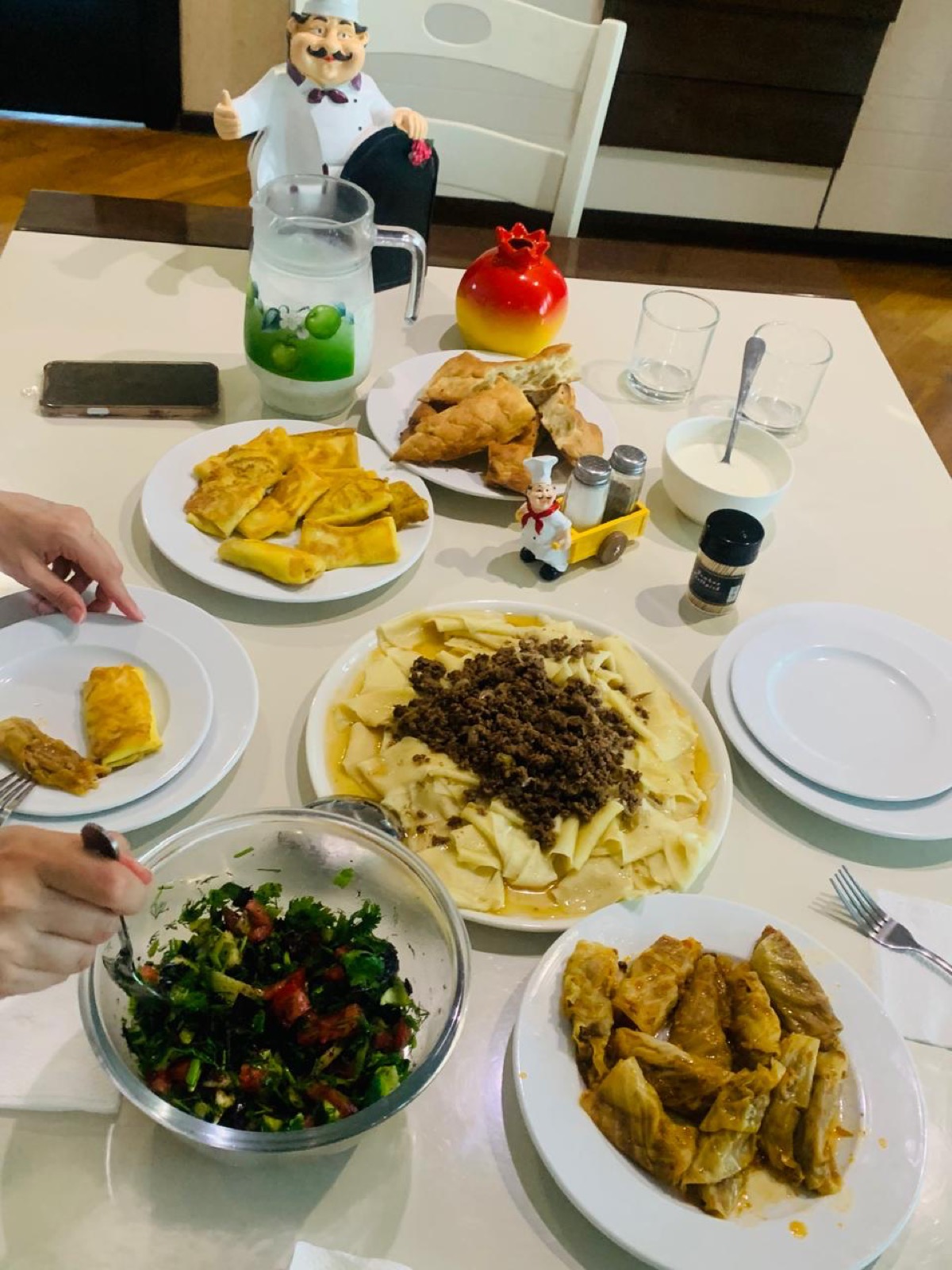 Dolma, plov and qutab served at a Baku cooking class table