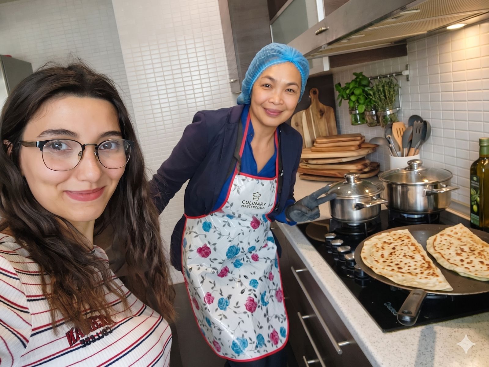 Guest cooking qutab during a hands-on cooking class in Baku